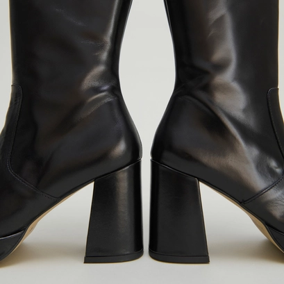 Platform boots in black leather | vendome
