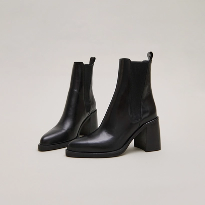 Boots &agrave; talons hauts et &eacute;lastiques in black leather | disco