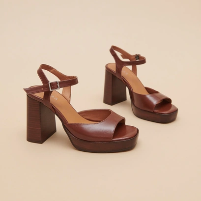 High-heeled sandals and platforms in brown leather | BAMBA
