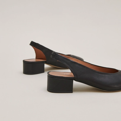 Ballet flats with open backs in black leather | vince