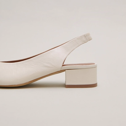 Ballet flats with open backs in ecru distressed leather | vince