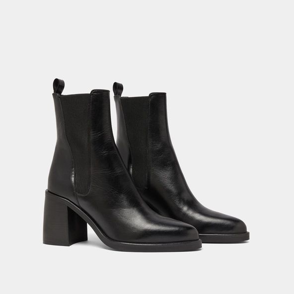 Boots à talons hauts et élastiques in black leather | DISCO