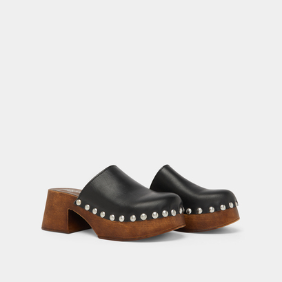 Platform mules in black leather | ELLIOT