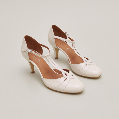 Heeled Mary Janes and adjustable buckles in ecru distressed leather | VERMEIL