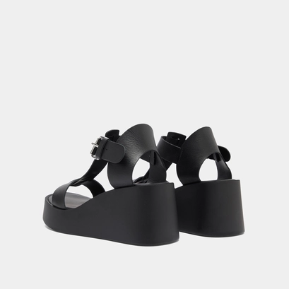 Sandales compens&eacute;es &agrave; boucles ajustables in black leather | estelle