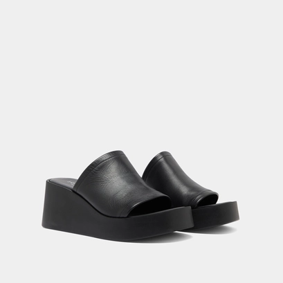 Mules compens&eacute;es in black leather | eugene