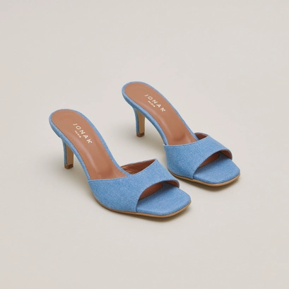 Heeled mules in blue denim | VERTIGO