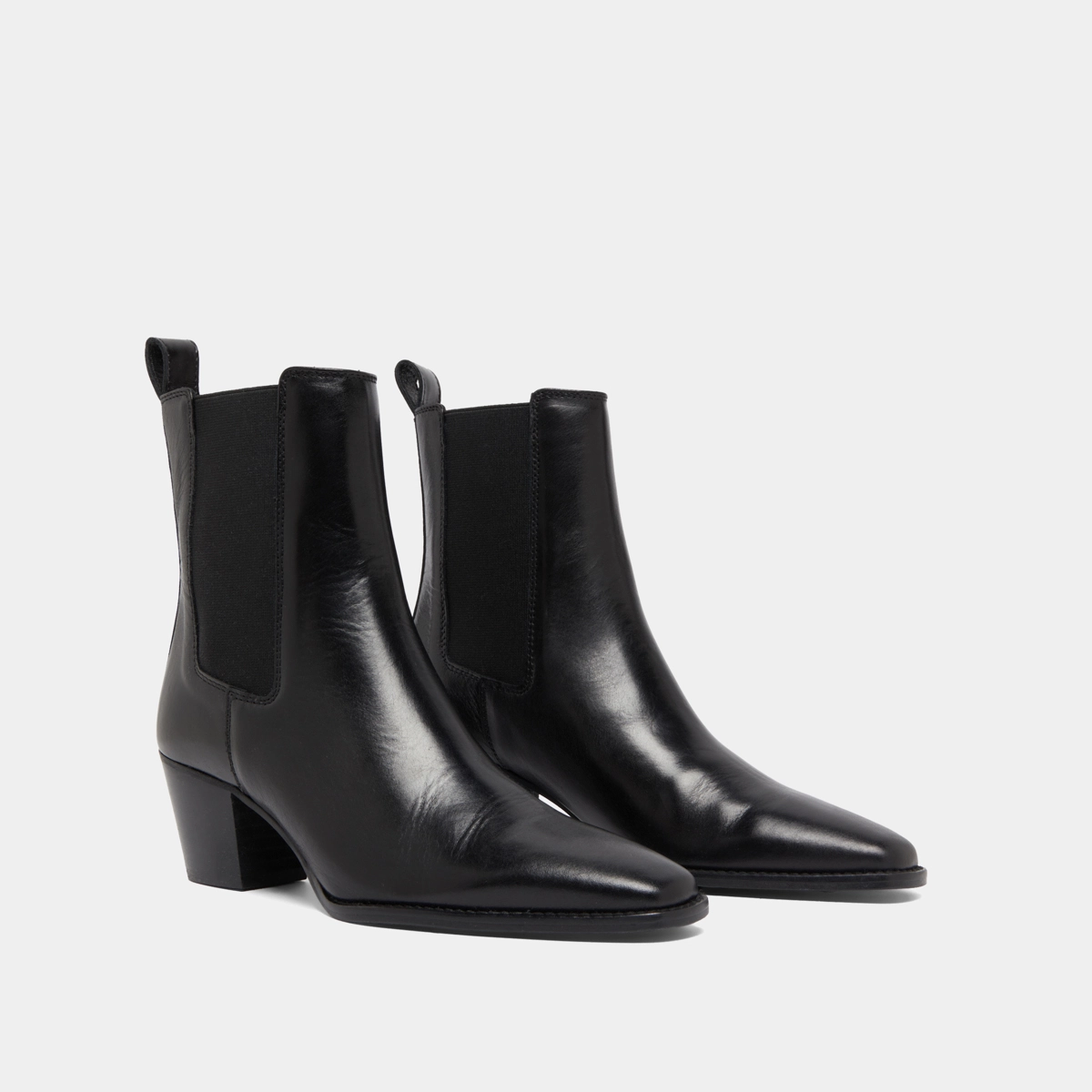 Bottines à talons biseautés et bouts poi... in black leather | BIRKIN