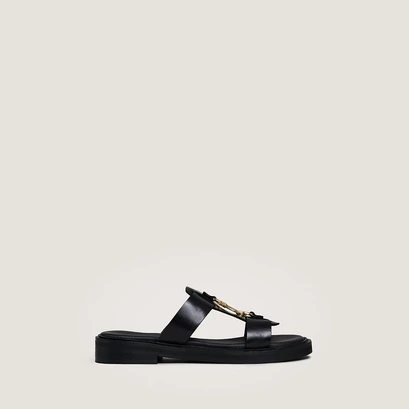 Mules &agrave; mors dor&eacute;s in black leather | dop
