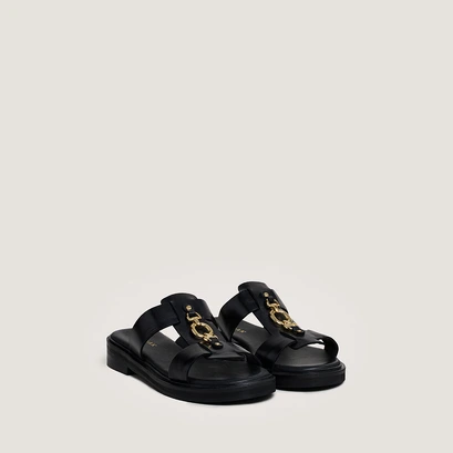 Mules &agrave; mors dor&eacute;s in black leather | dop