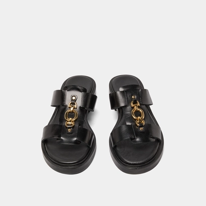 Mules &agrave; mors dor&eacute;s in black leather | dop