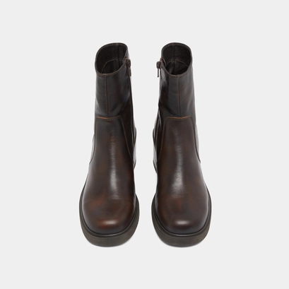 Boots &agrave; talons in brown patinated leather | panda