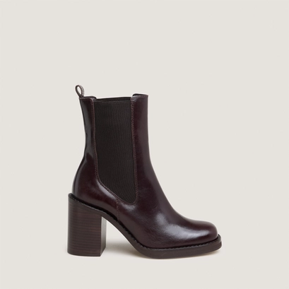 Bottines &agrave; talons d&eacute;bordants in dark brown leather | bretz