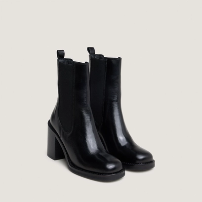 Bottines &agrave; talons d&eacute;bordants in black leather | bretz