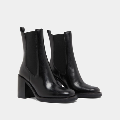 Bottines &agrave; talons d&eacute;bordants in black leather | bretz