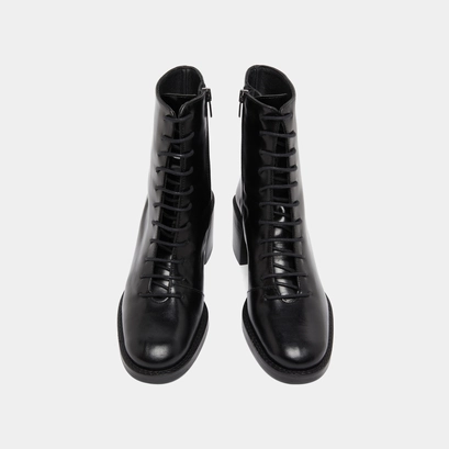 Bottines &agrave; lacets et talons d&eacute;bordants in black leather | brindille