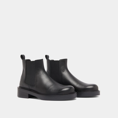 Boots &agrave; &eacute;lastiques in black leather | melanie