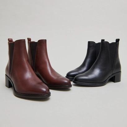Bottines &agrave; &eacute;lastiques triangulaires in cognac patinated leather | chilo