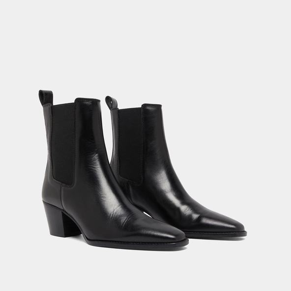 Bottines à talons biseautés et bouts poi... in black leather | BIRKIN