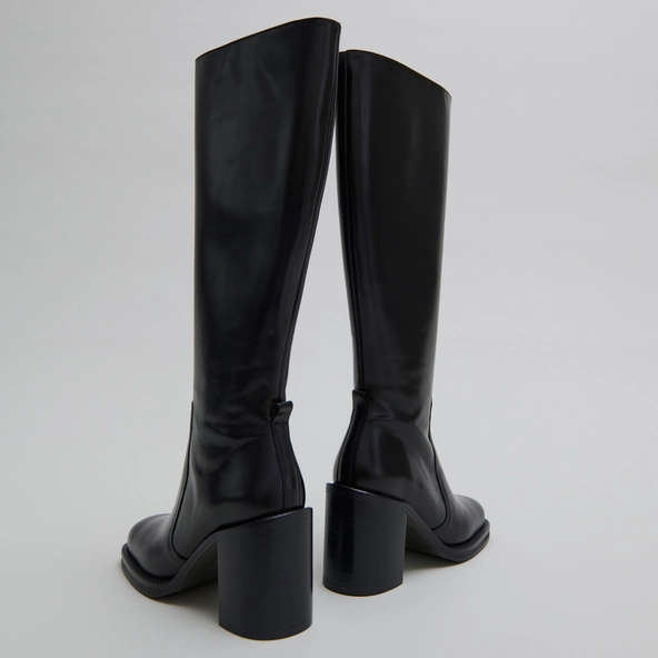 Boots with overflowing heels in black leather calf size S | BRETZEL